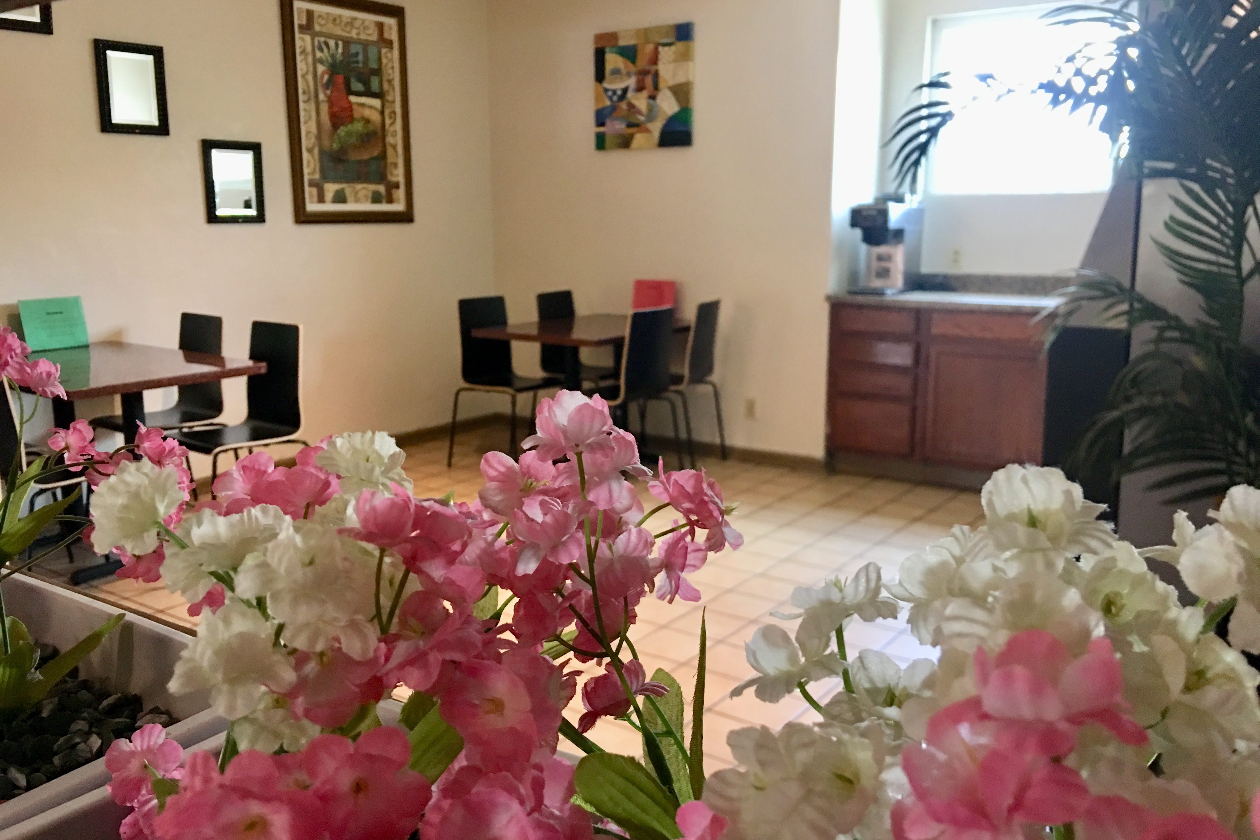 Lobby area with dining table and seats